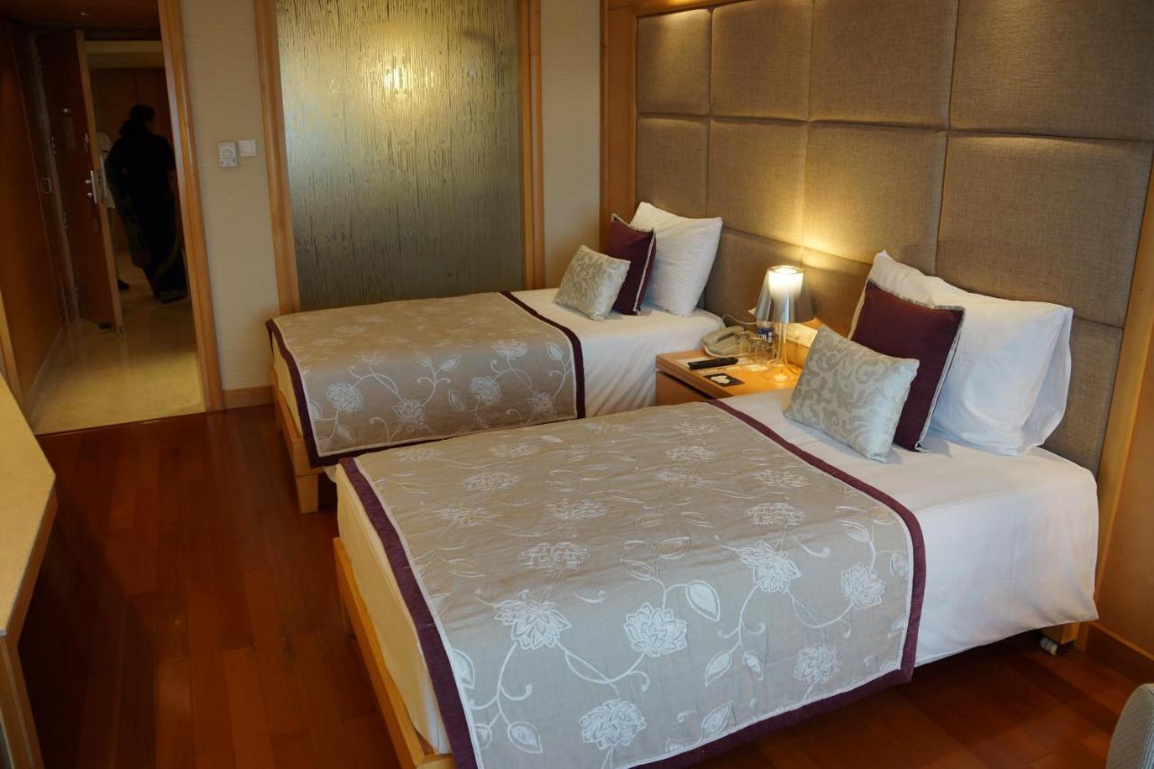 Jaypee Vasant Continental Hotel New Delhi Luaran gambar A room at the hotel